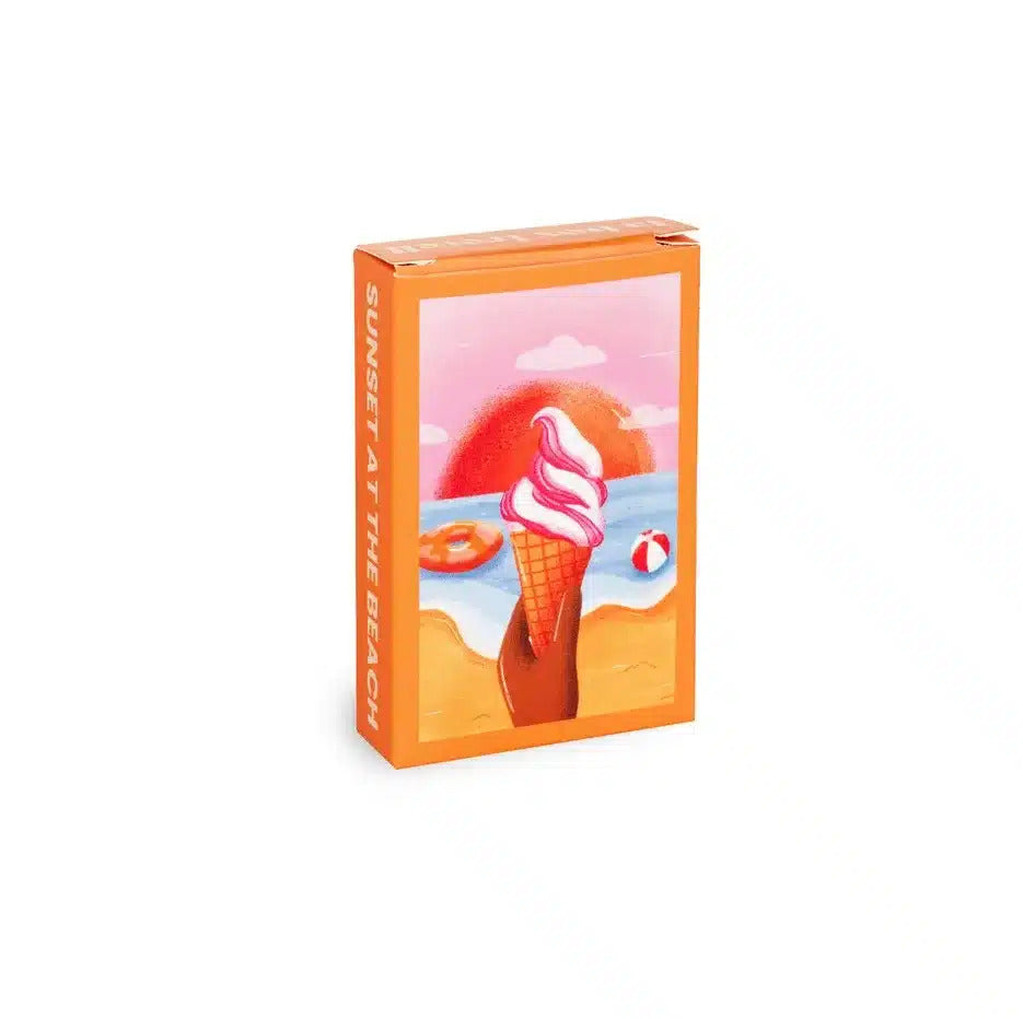 Mini puzzle de cornet de glace avec coucher de soleil vibrant.