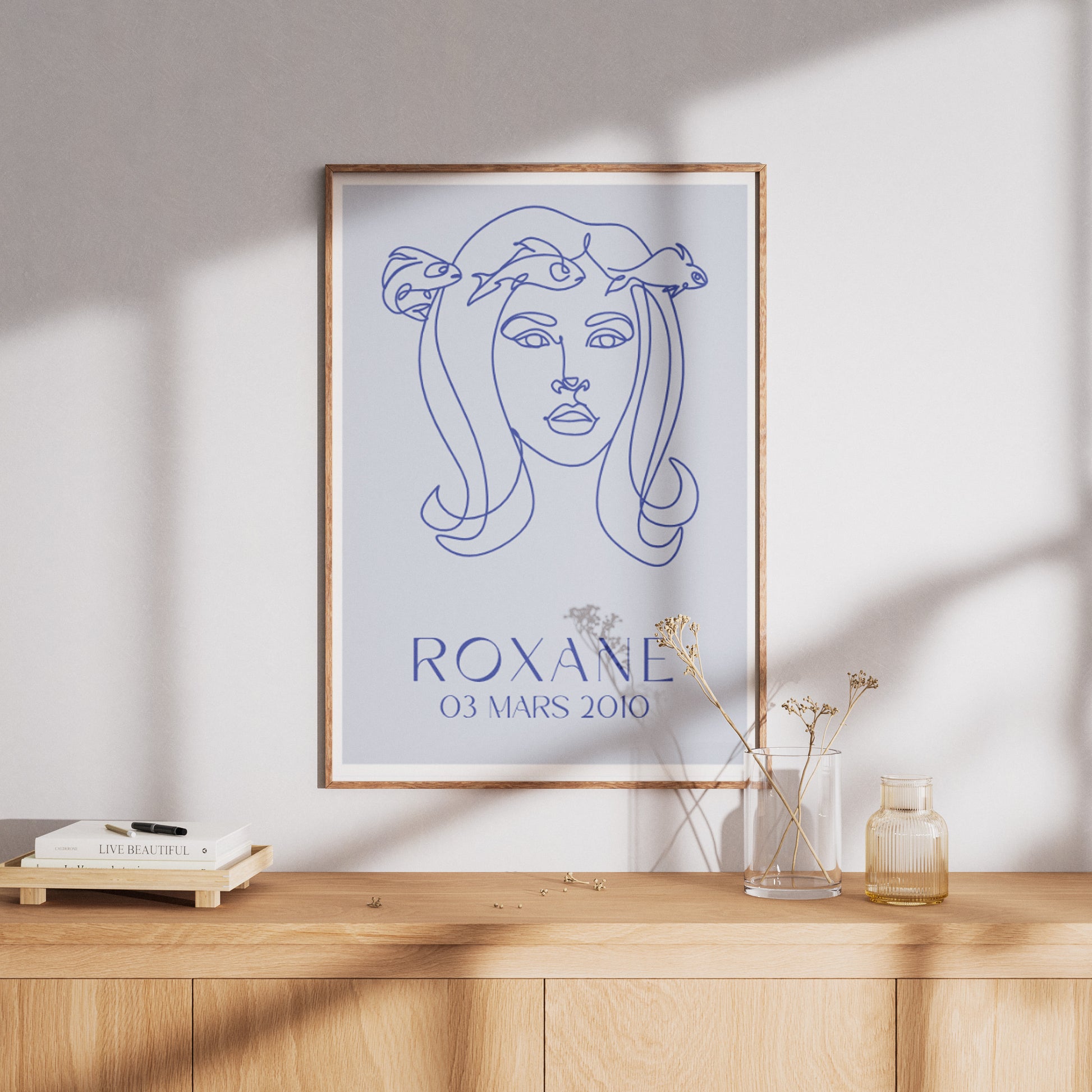 Affiche linéaire du signe des Poissons avec tracé fluide.