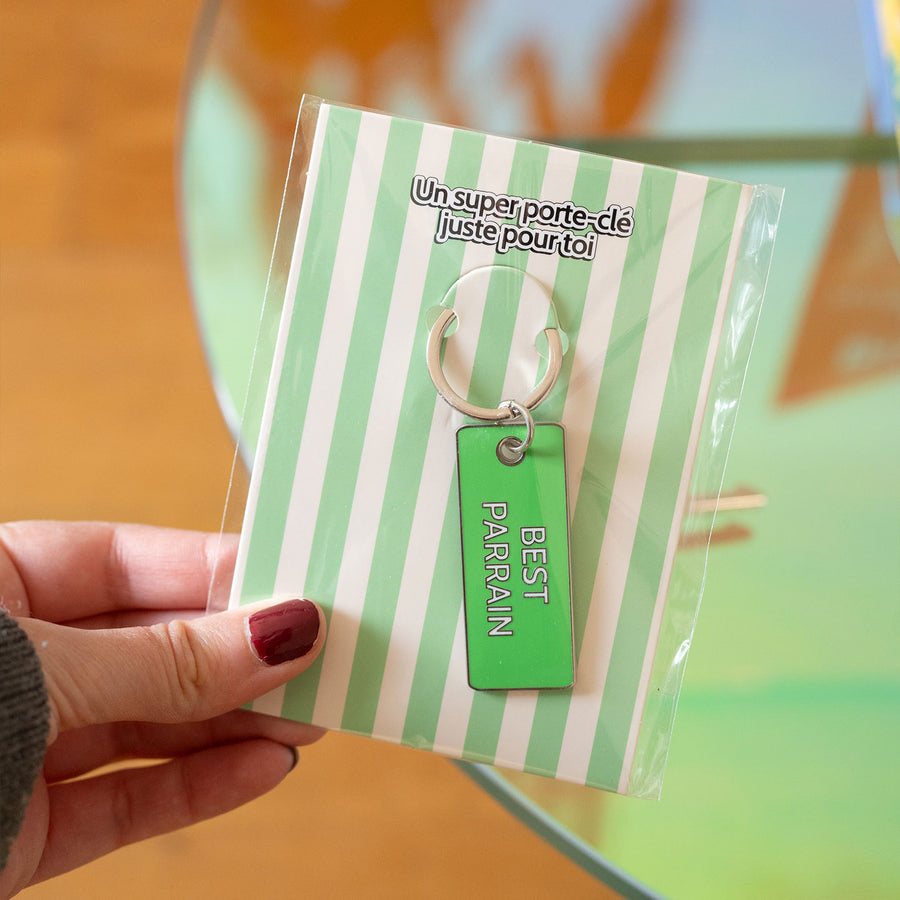 Porte-clés 'Meilleur Parrain' avec inscription humoristique.