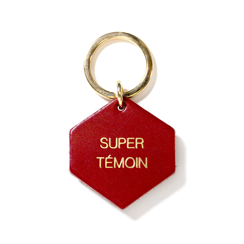 Porte-clé en cuir avec inscription Super Témoin en relief