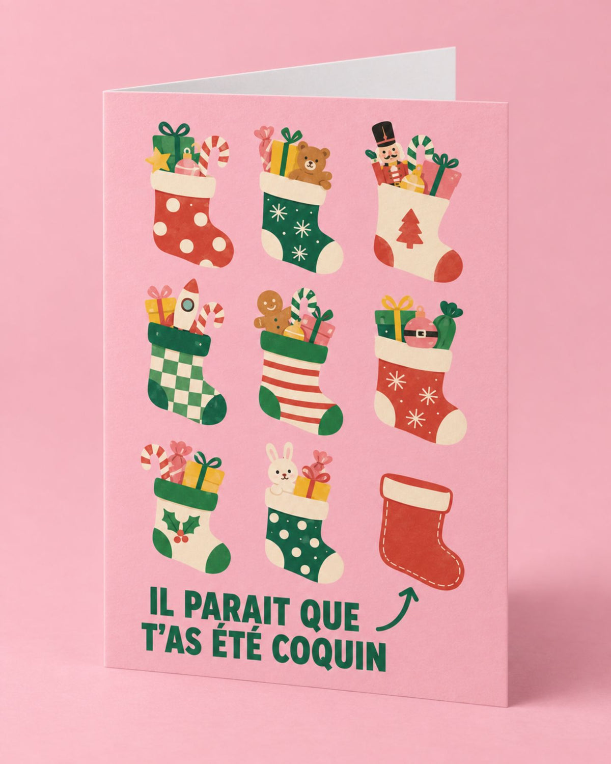 Carte humoristique rose avec chaussettes rouges et cadeau vide