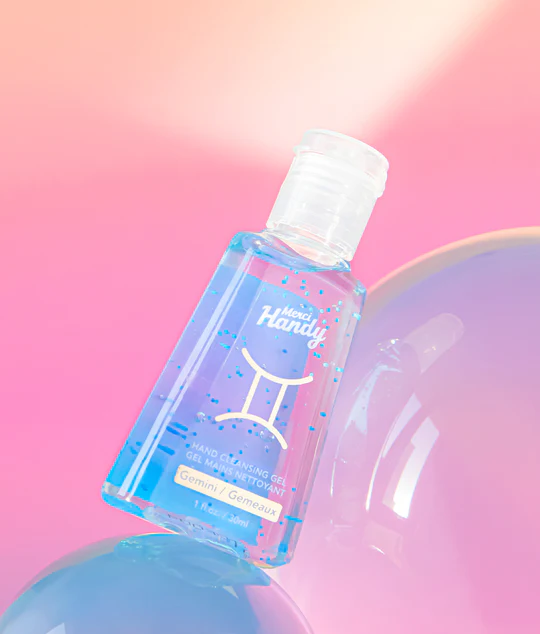 Gel pour les mains Gémeaux avec motif étoilé sur l'étiquette.