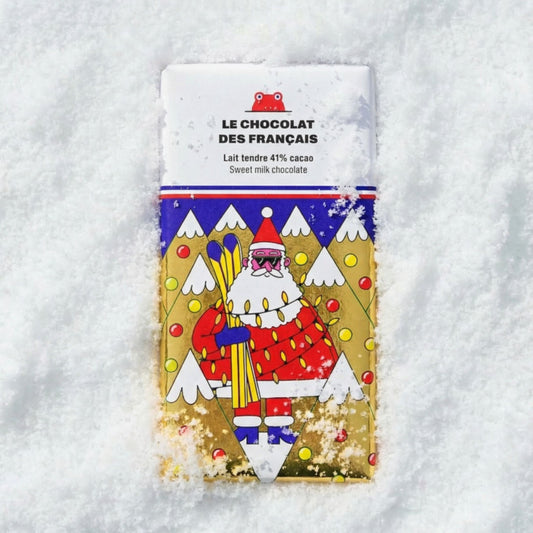 Tablette de chocolat au lait avec motif de Père Noël en ski