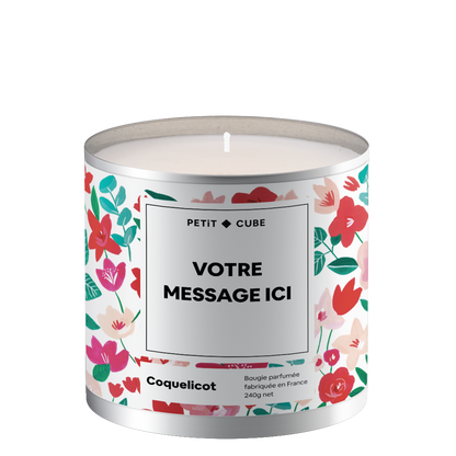 Bougie personnalisée avec motif coquelicot sur la surface.