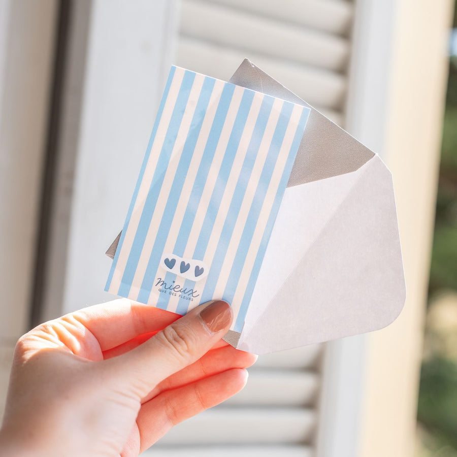 Carte à gratter avec message doré sur fond coloré
