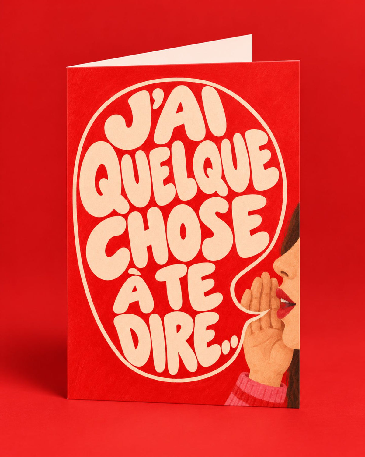 Carte rouge ouverte « J’ai quelque chose à te dire », illustrée d’un secret chuc