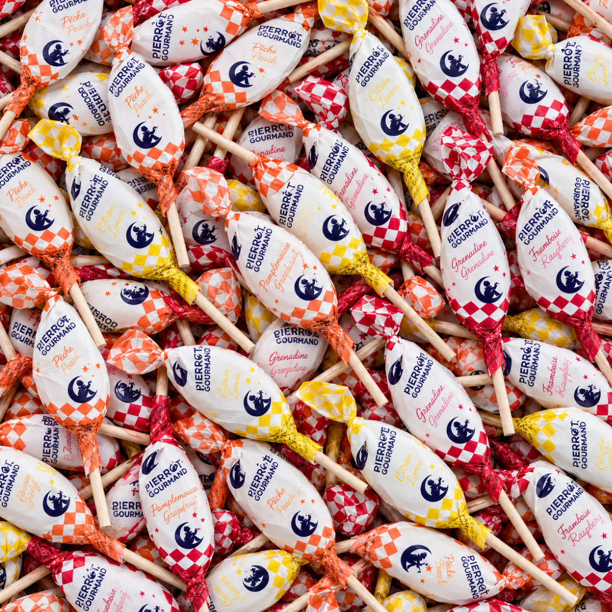 Sucettes Pierrot Gourmand aux emballages à carreaux et parfums variés
