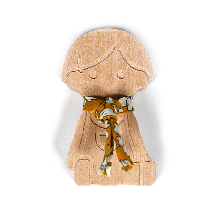 Little girl figurine in wood