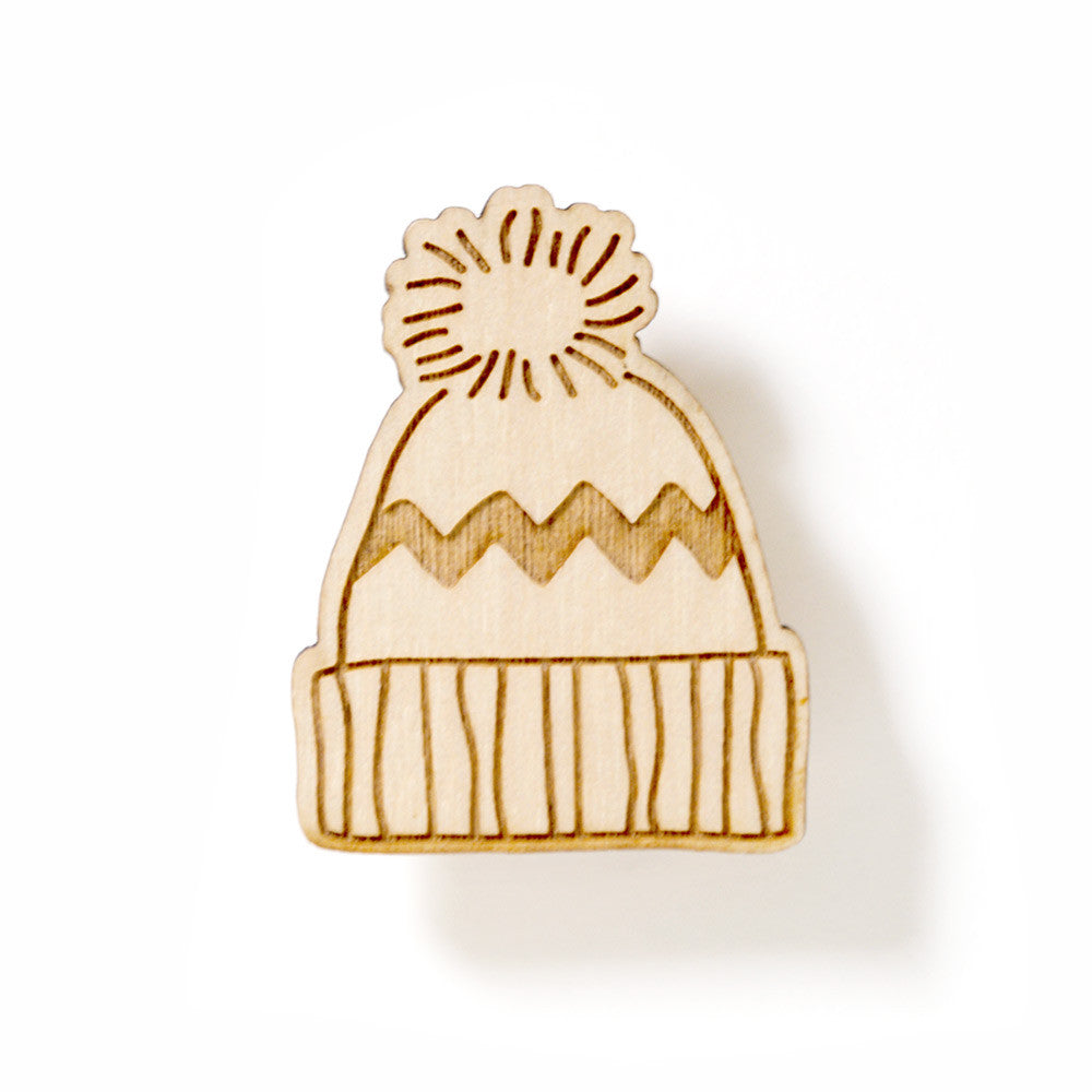 Pin's en bois bonnet
