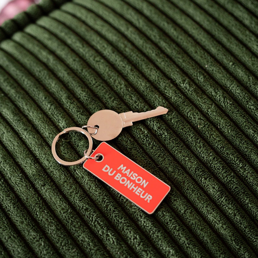 Porte-clé en forme de maison avec détails en relief
